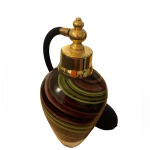 Glass perfume bottle with atomizer/purple and olive green swirl glass